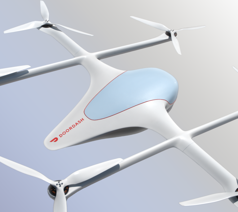 Official DoorDash illustration of its white delivery drone with a blue cargo cover