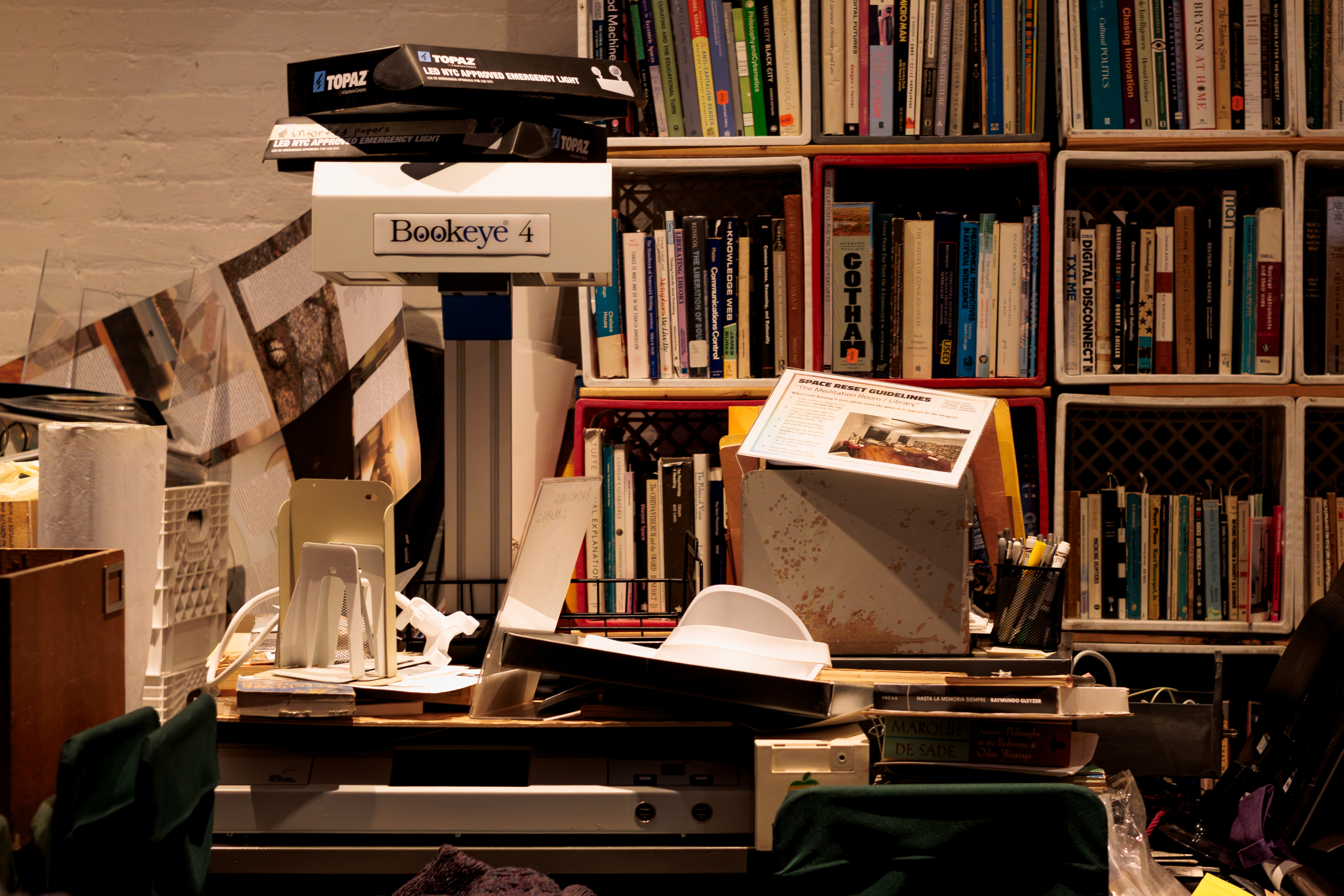 A Bookeye scanner surrounded by books in the Cybernetics Library