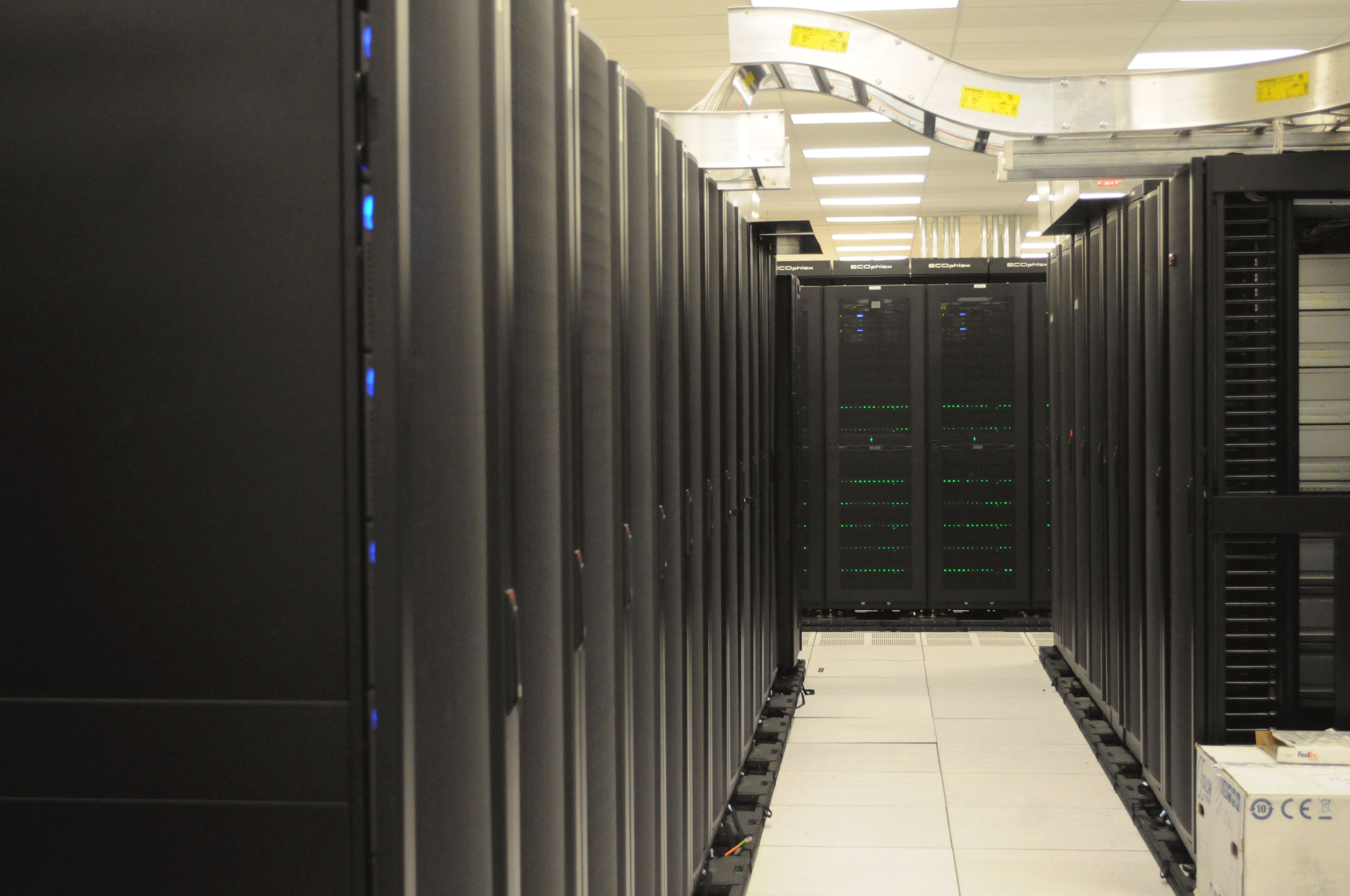 Server racks lining an aisle at the NERSC computing center