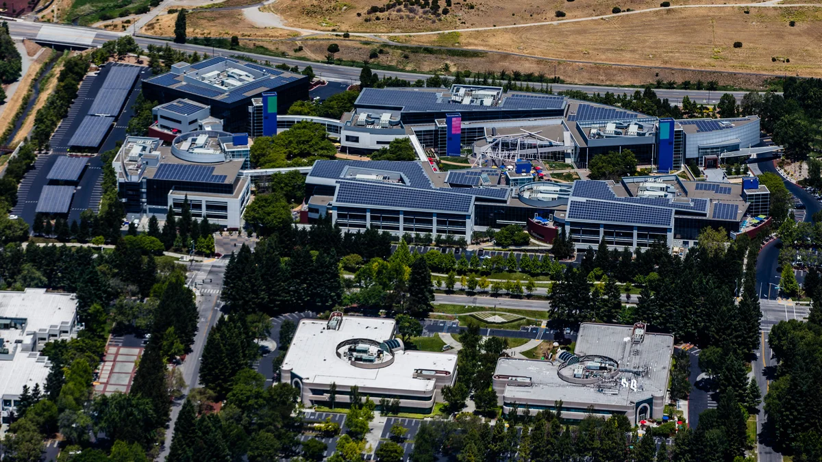 Aerial view of buildings and trees at Google’s Mountain View campus