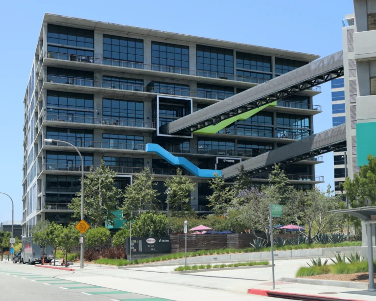 TikTok signs on a glass office building with elevated walkways in Culver City
