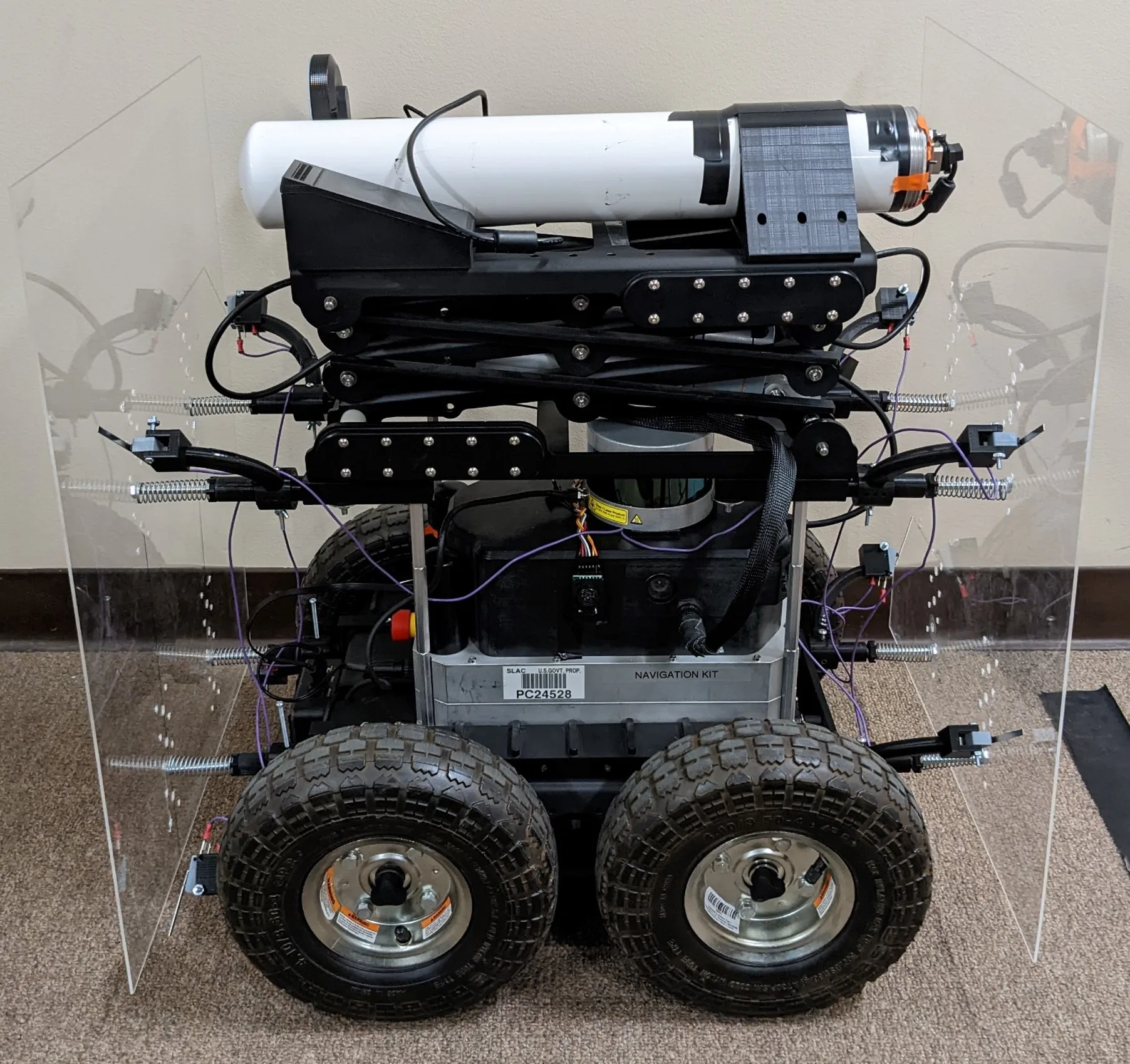 SLAC’s ROAM robot with a cylindrical sensor above a wheeled base