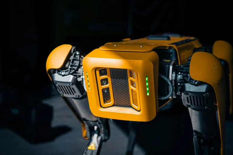 Front view of a yellow Boston Dynamics Spot robot
