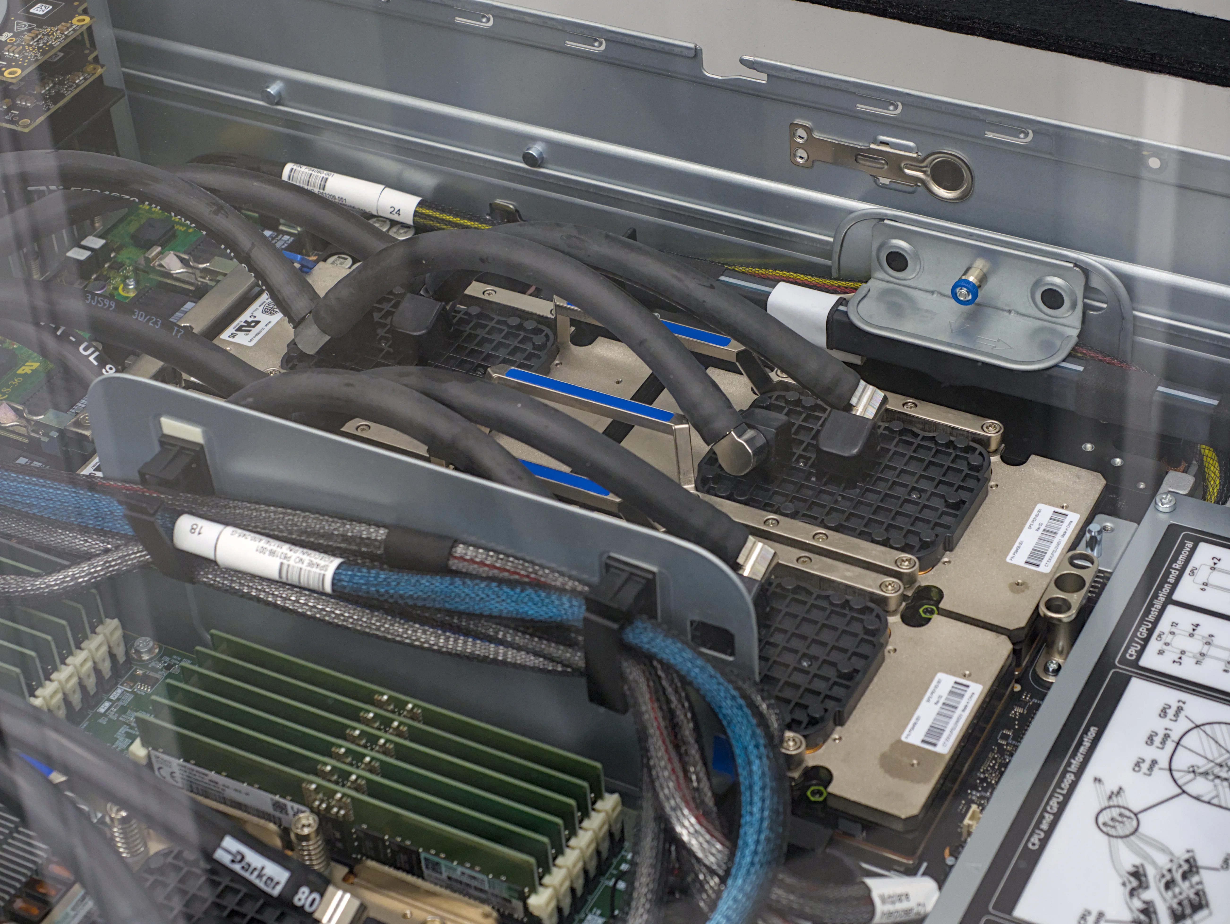 Cooling pipes and computer components inside a TSUBAME 4.0 computing node